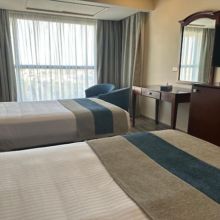 Stay Inn Pyramids Hotel Al Kawm al Akhdar ภายนอก รูปภาพ