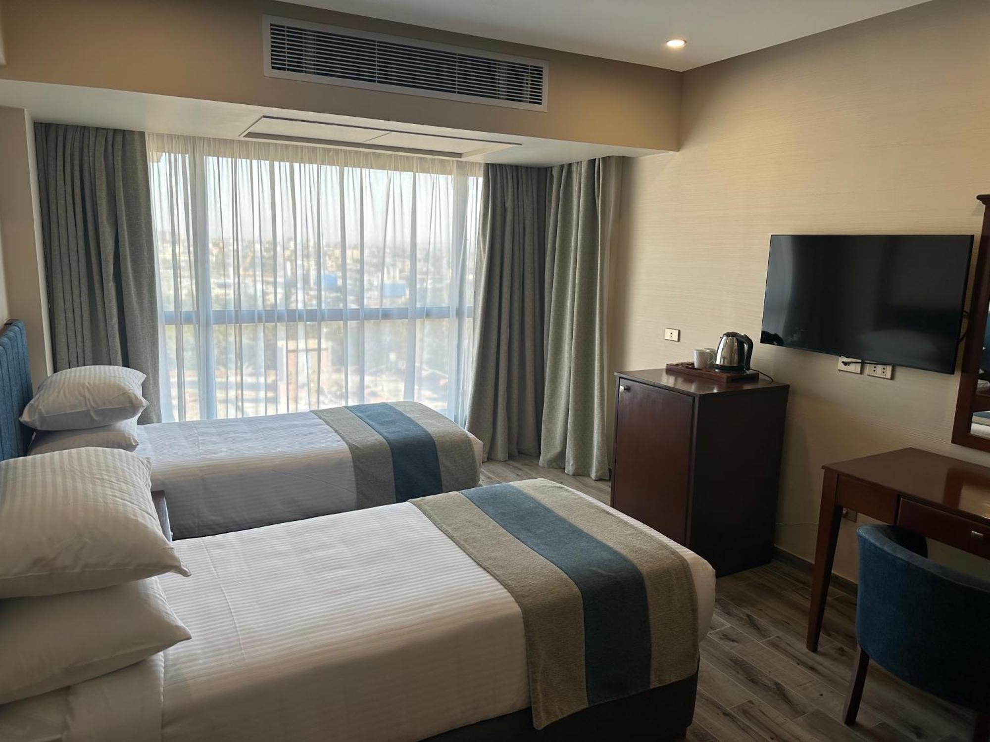 Stay Inn Pyramids Hotel Al Kawm al Akhdar ภายนอก รูปภาพ