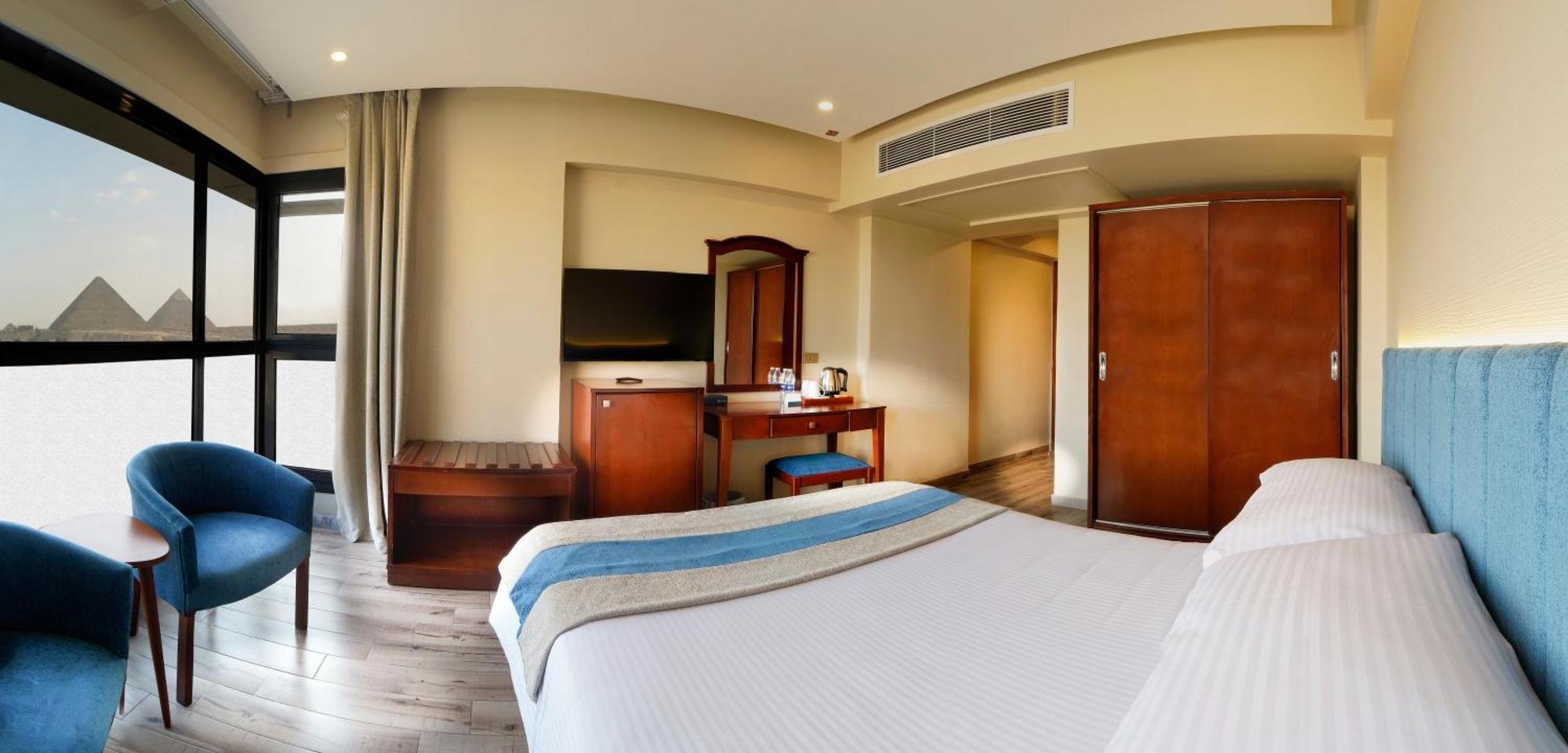 Stay Inn Pyramids Hotel Al Kawm al Akhdar ภายนอก รูปภาพ