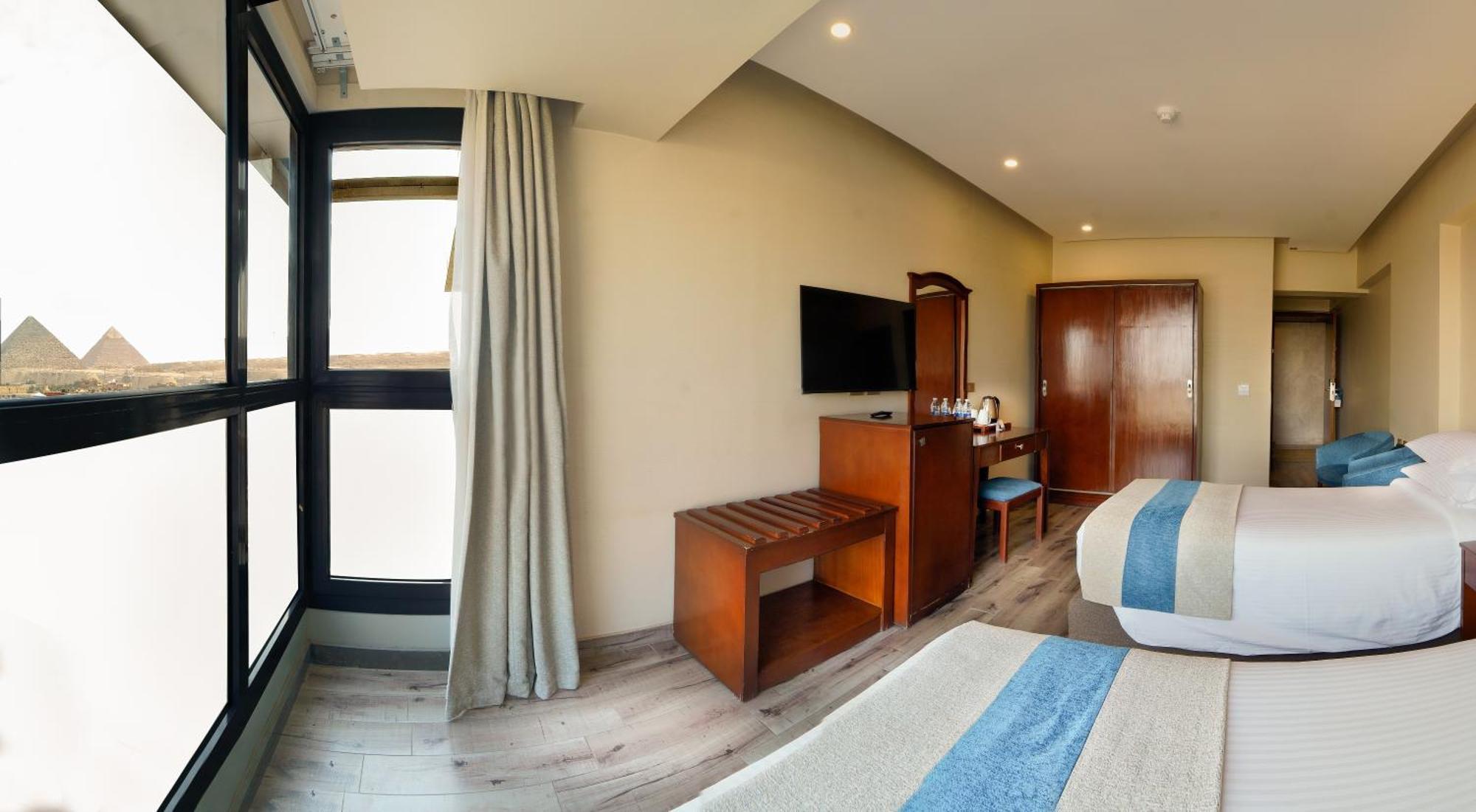 Stay Inn Pyramids Hotel Al Kawm al Akhdar ภายนอก รูปภาพ