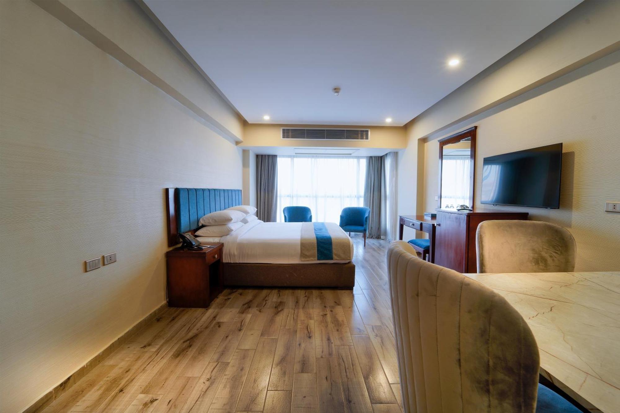 Stay Inn Pyramids Hotel Al Kawm al Akhdar ภายนอก รูปภาพ